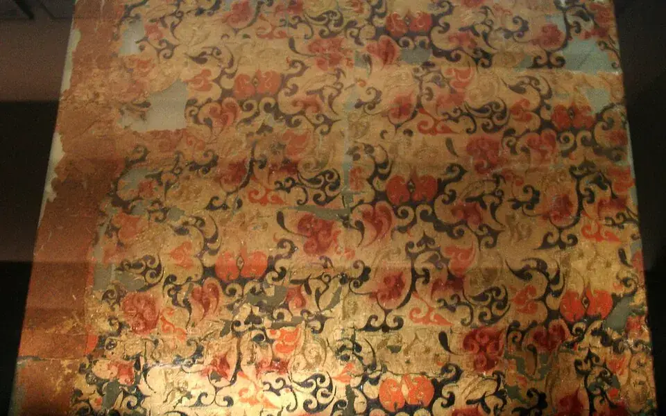 Silk weaving begins with drawing filaments from cocoons