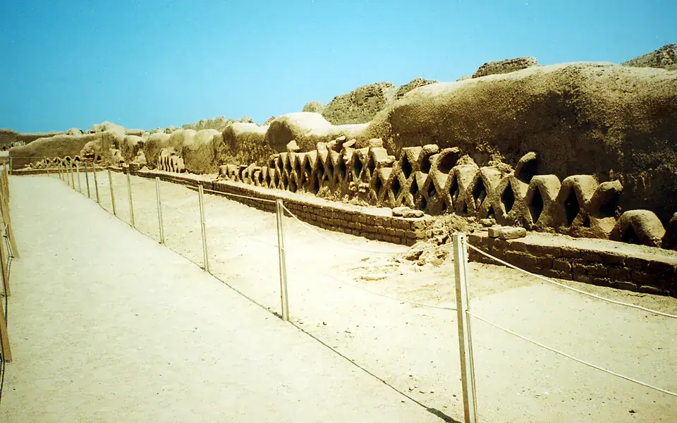 Decorated adobe walls at Chan Chan in Peru