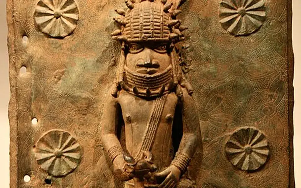 A Benin brass relief plaque showing court figures