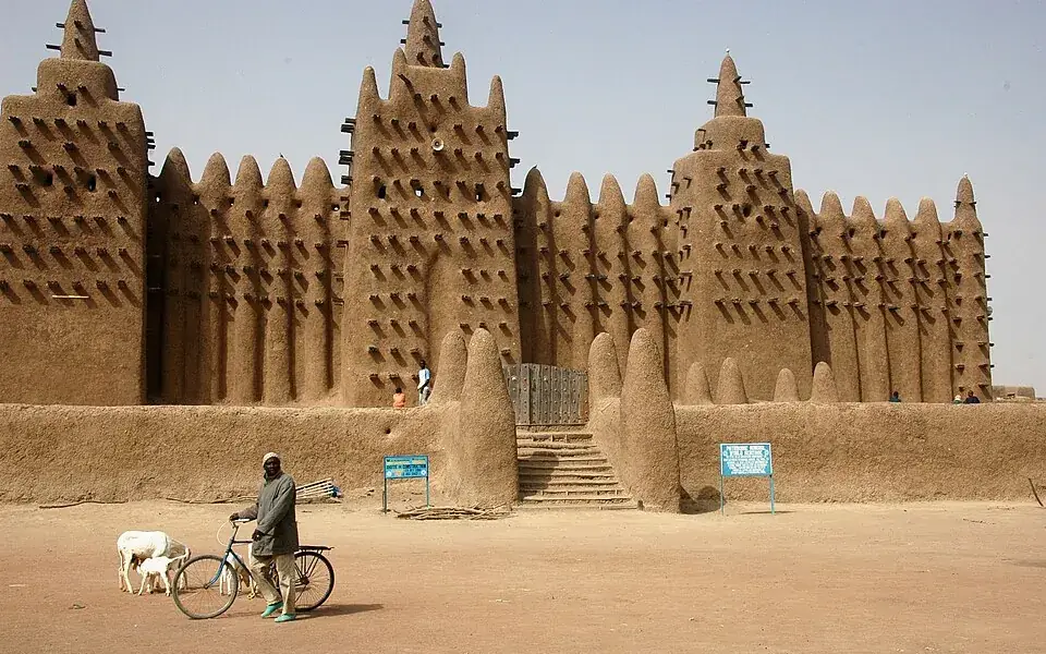 A mud-brick mosque depends on its community for renewal