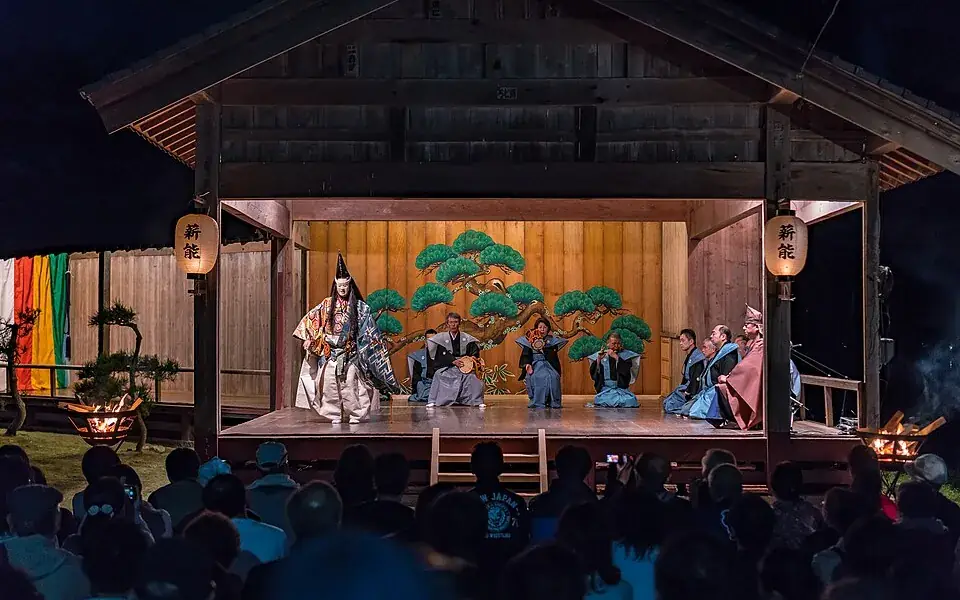 A Noh performance on a traditional stage