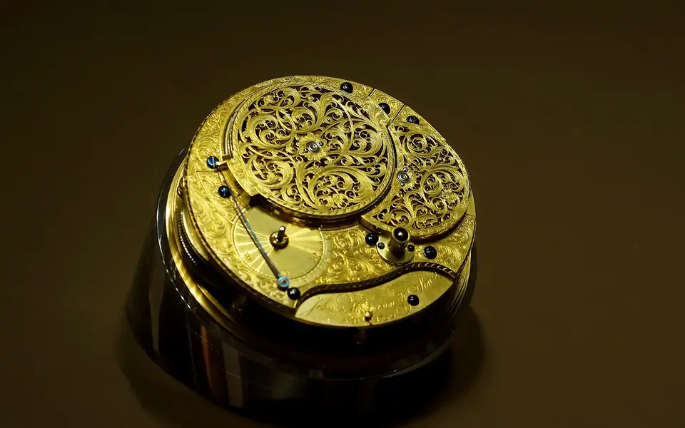 The ornate mechanism of Harrison’s H4 timekeeper displayed at the Royal Observatory Greenwich