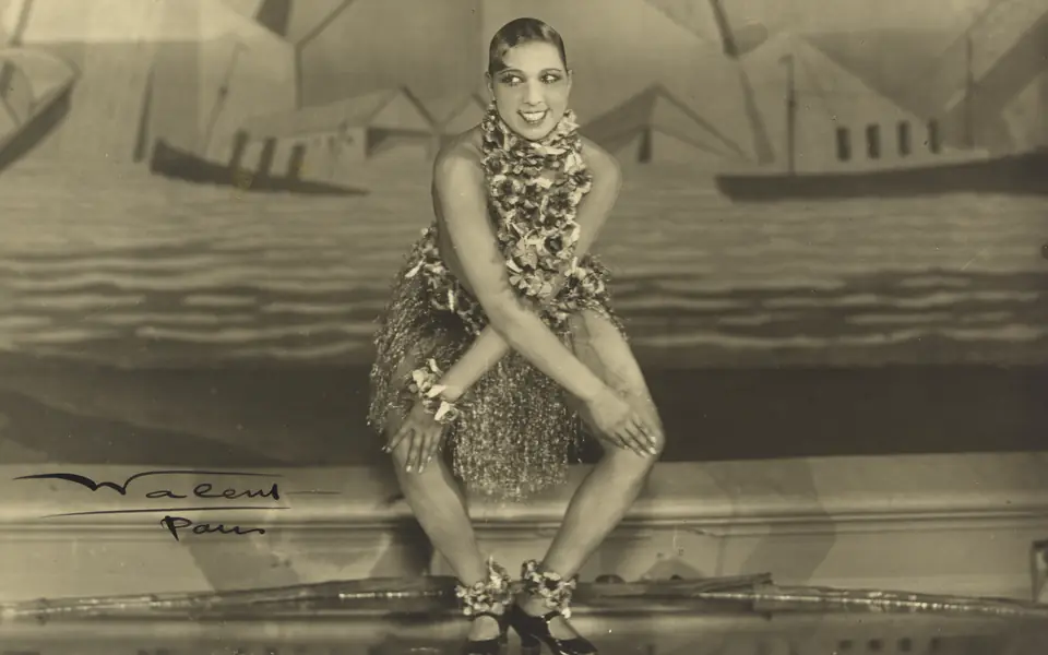 Josephine Baker performing in a 1926 photograph by Stanislaus Julian Walery, preserved by the National Portrait Gallery